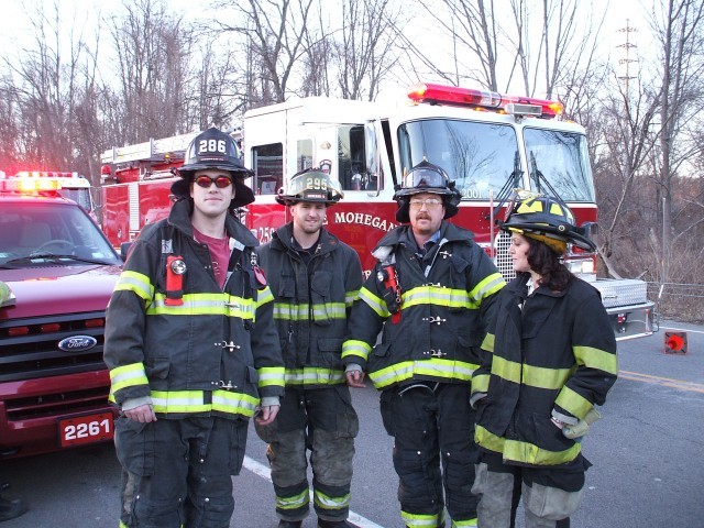 Firefighter's Smiling While Working In The Cold